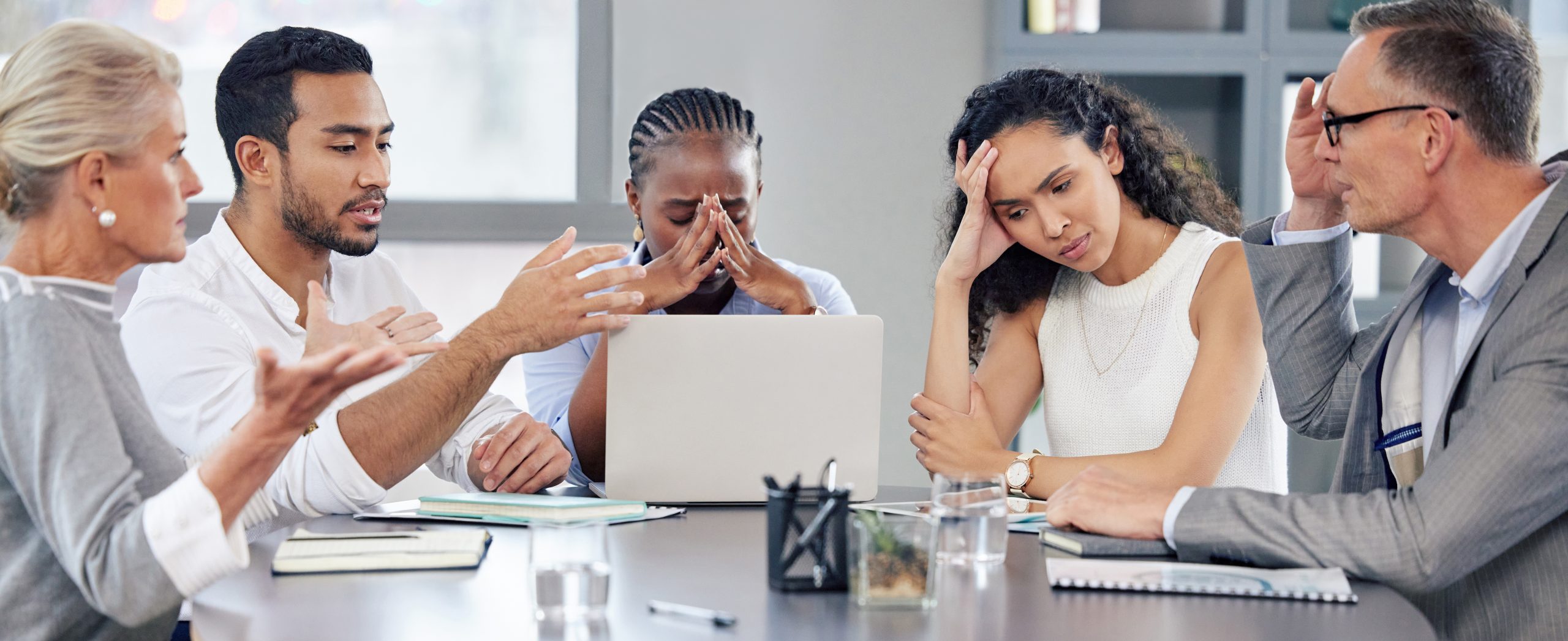 Business people, group and meeting with stress, office or negotiation for problem solving, frustrated or fail. Businessman, women and talk for solution, strategy or plan with anger, mistake or risk